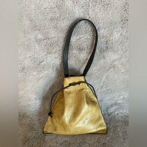 JUTTA NEUMANN Chic Gold and Black Shoulder Bag